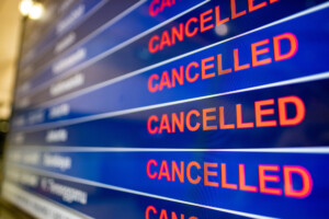 picture of airport screen showing cancelations